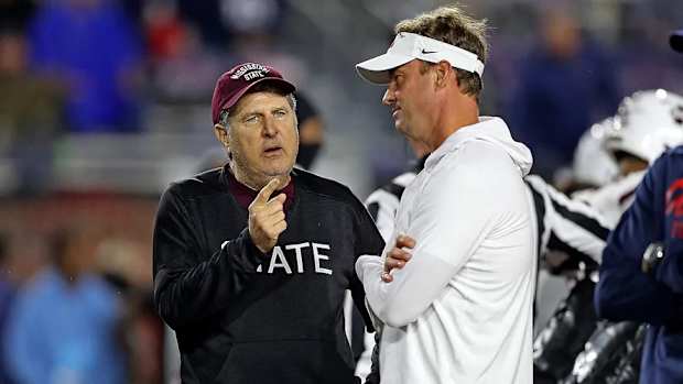lane kiffin mike leach